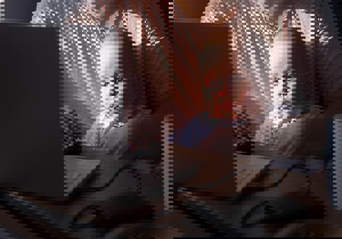 Caucasian Babysitting With Her Mother Using Laptop 2024 10 14 16 02 48 Utc Min (3)